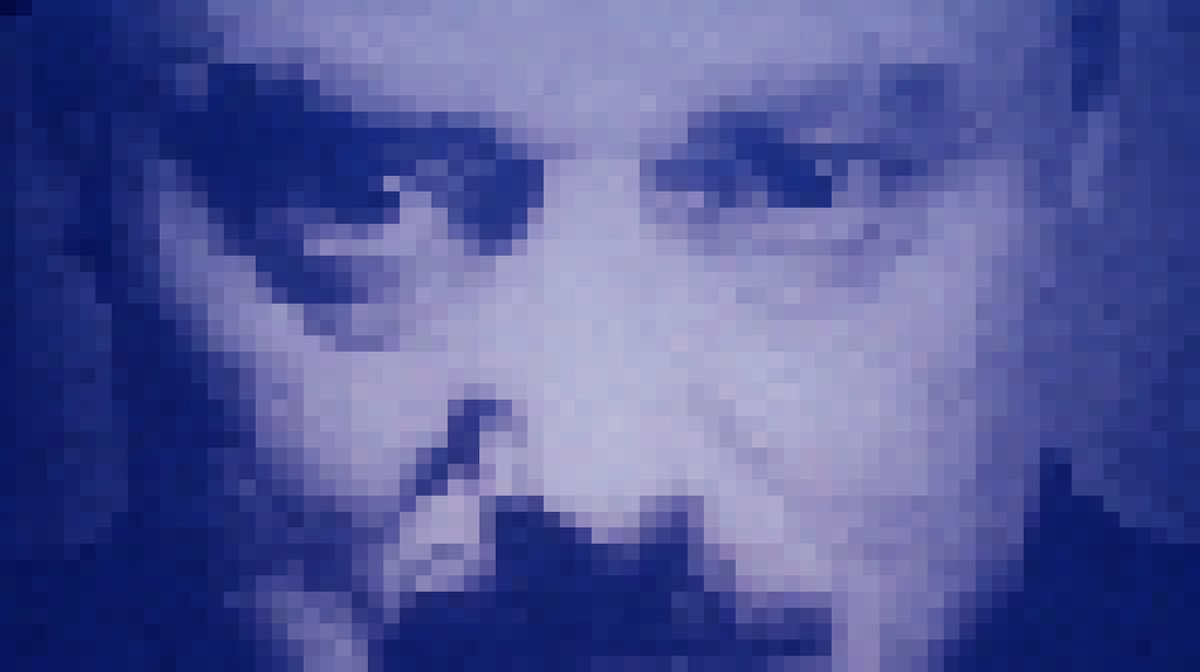 A picture of Big Brother from the 1984 movie. A middle aged man looks at you. He has a moustache
